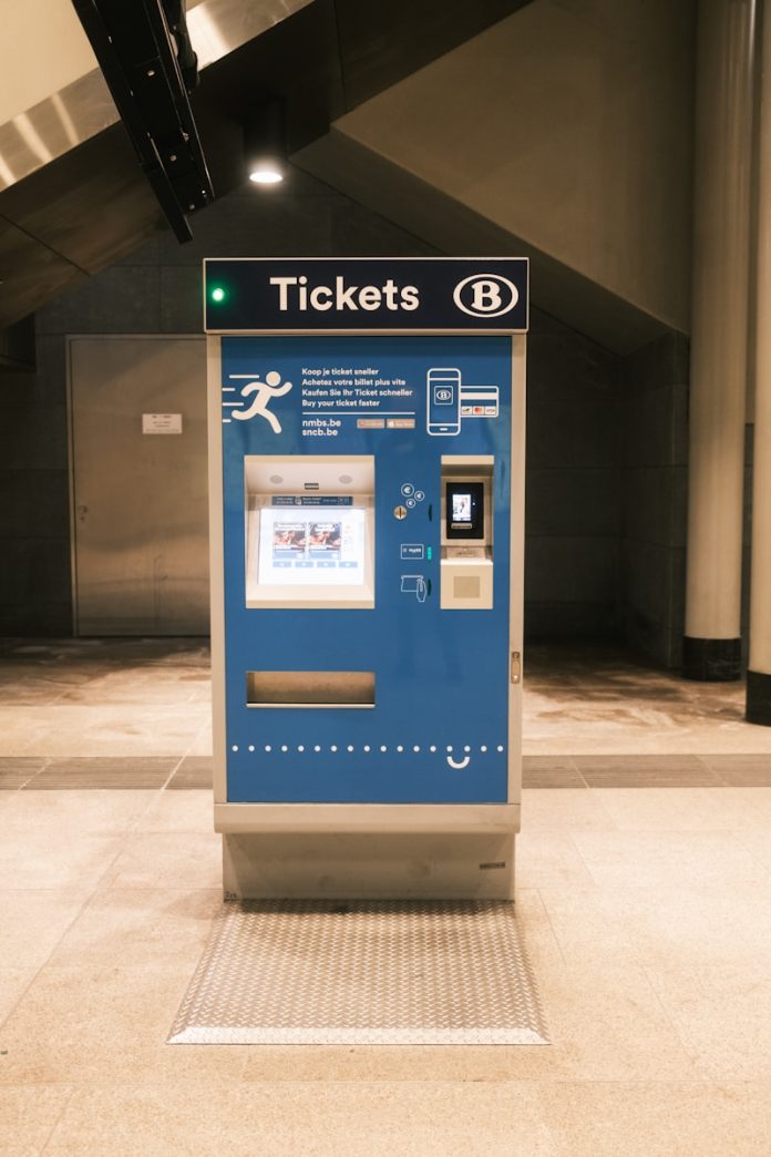 A ticket machine sitting in a large room